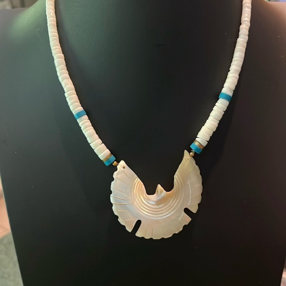 Mother of pearl Phoenix/bird necklace with shell beads.